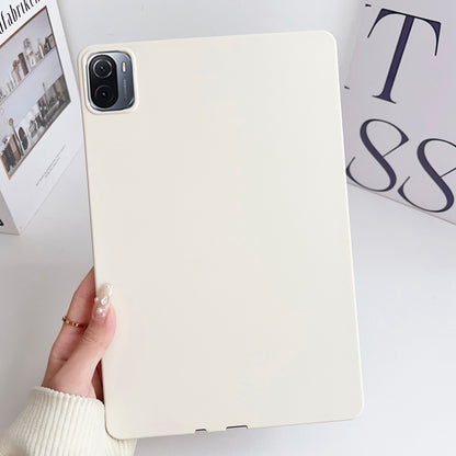 Milk white tablet case with camera cutout and slim protective edges.