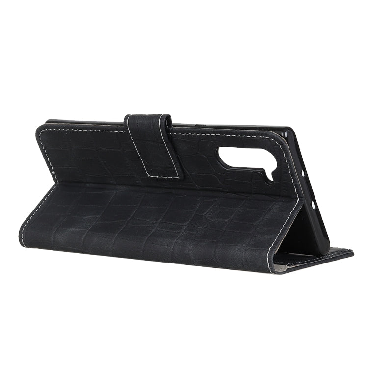 Black crocodile-texture flip wallet case with fold-out stand for hands-free viewing