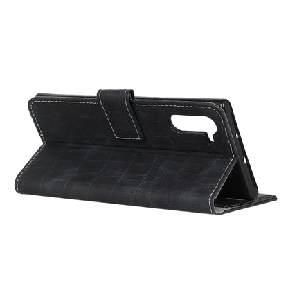 Black crocodile-texture flip wallet case with fold-out stand for hands-free viewing