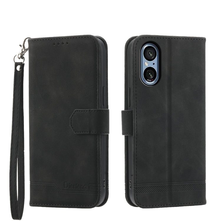Black wallet-style phone case with wrist strap and magnetic flap; front cover window.