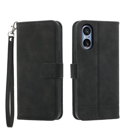 Black wallet-style phone case with wrist strap and magnetic flap; front cover window.