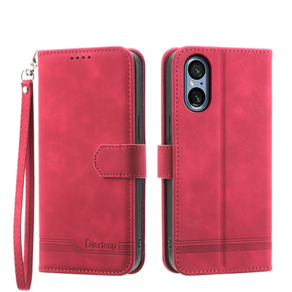 Red wallet-style phone case with wrist strap and magnetic flap; front cover window.