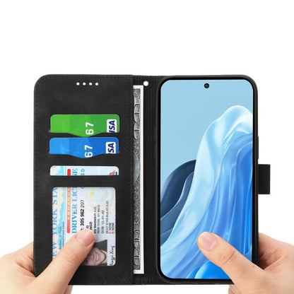 Black flip wallet phone case with card slots and cover holding the phone.