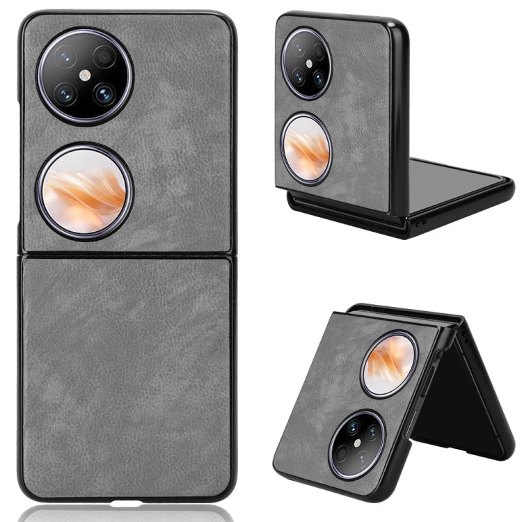 Grey litchi-texture phone case with camera cutout and foldable stand