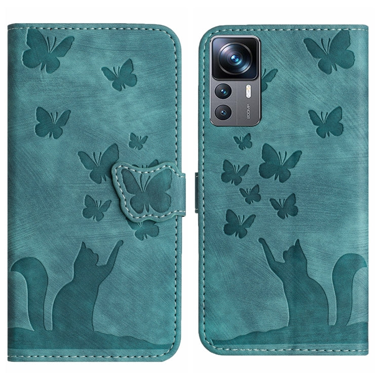 Teal flip leather phone case with butterfly embossing and cat silhouettes, side flap