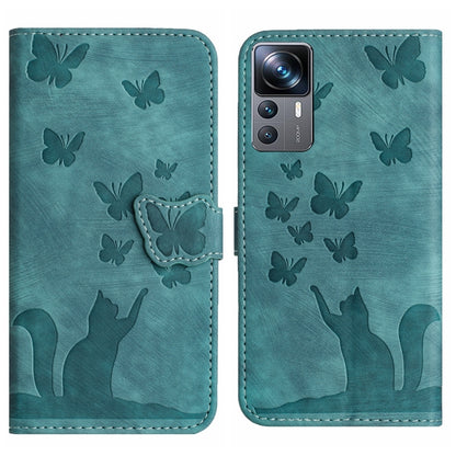 Teal flip leather phone case with butterfly embossing and cat silhouettes, side flap