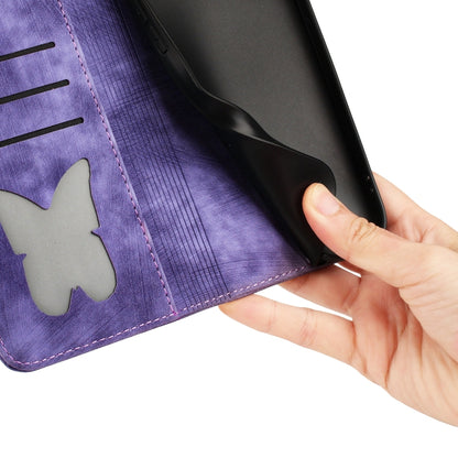Purple embossed butterfly cat leather phone case close-up with hand opening flap