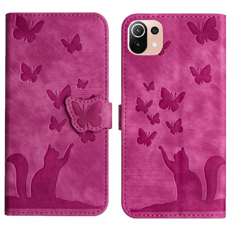 Pink embossed butterfly and cat flip leather phone case with snap strap and stitching