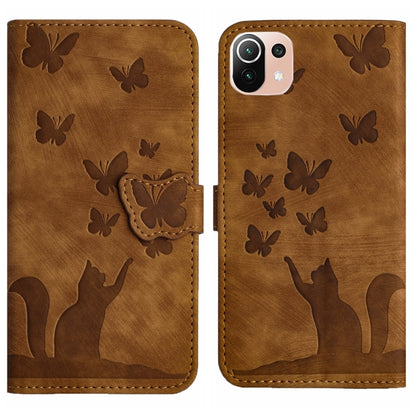 Brown embossed flip phone case with butterfly and cat silhouettes