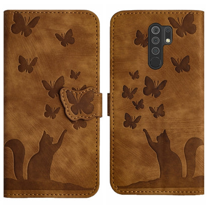 Brown leather-style flip phone case with embossed butterflies and cat silhouette