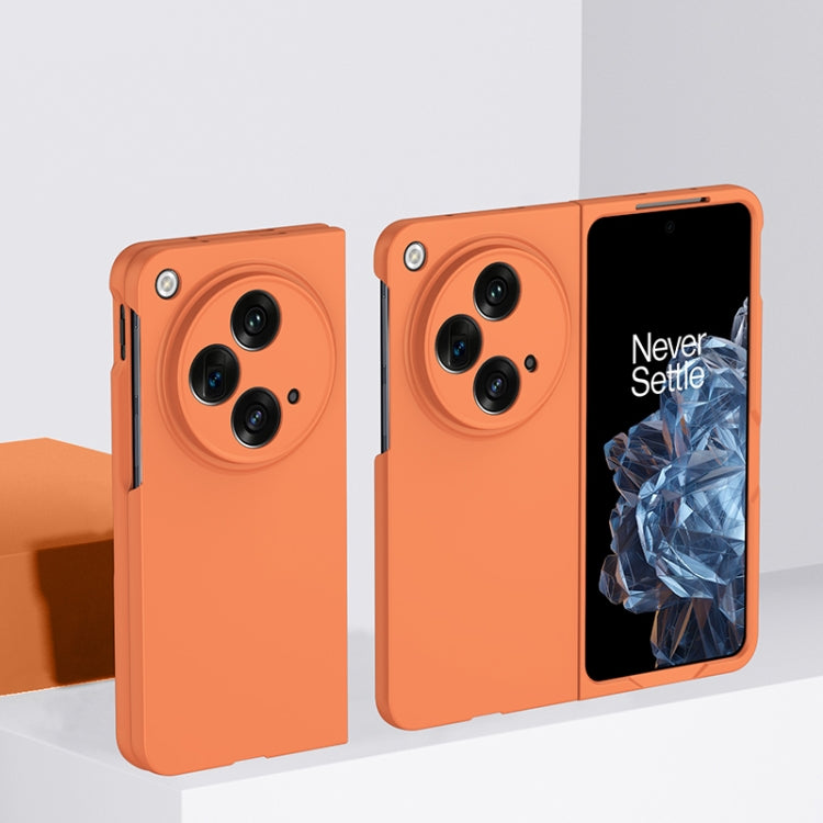 Orange PC phone case with camera cutouts and slim side profile