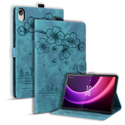 Light teal folio tablet case with floral embossed pattern and viewing stand