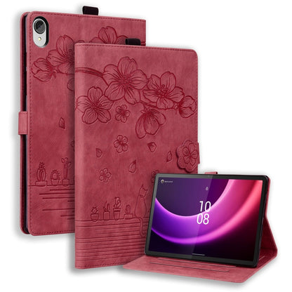 Red folio tablet case with floral embossed pattern and built-in stand