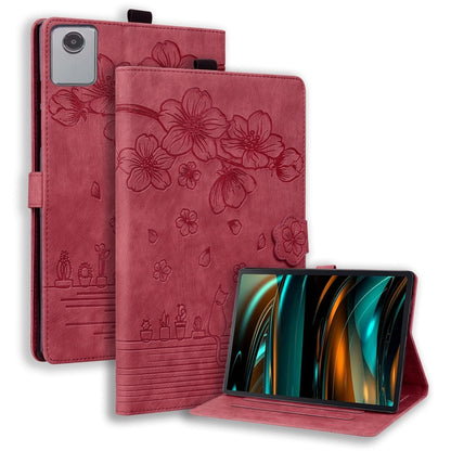 Red folio tablet case with floral embossed design and front kickstand stand.