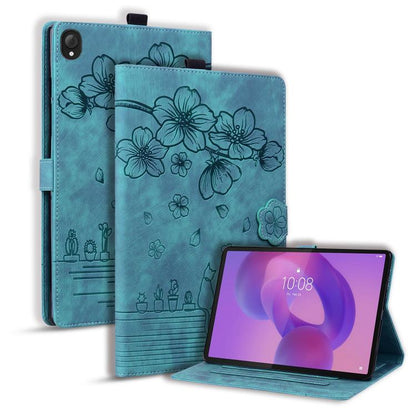Embossed leather tablet case with cartoon flower and cat design, teal