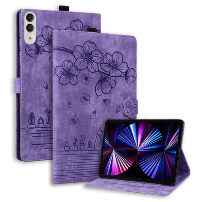 Purple embossed floral tablet case with folio stand and card slot cutout