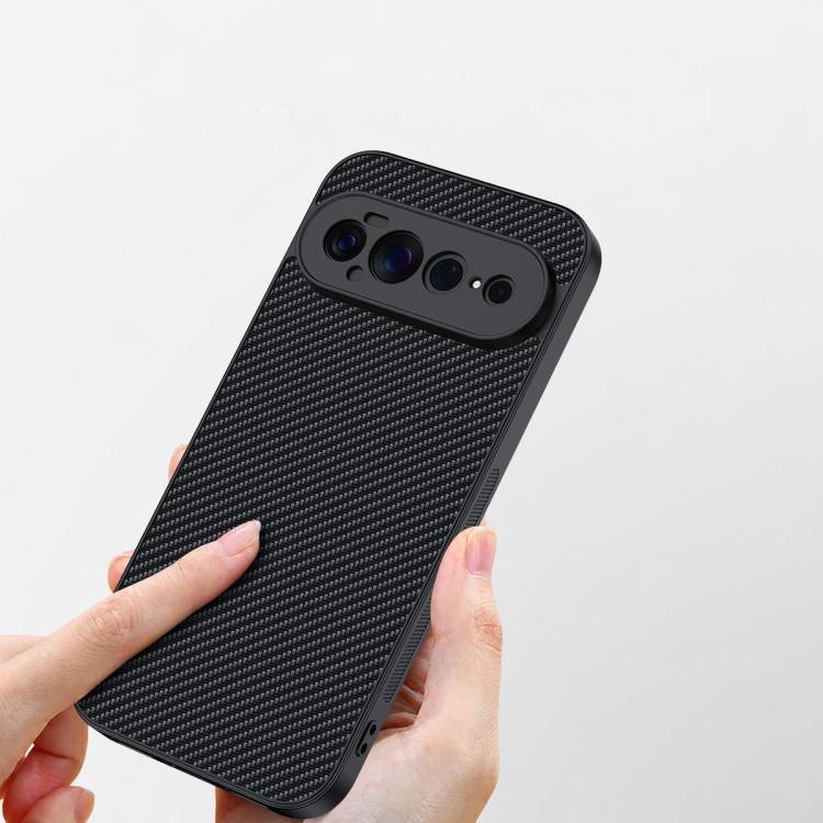 Carbon fiber textured phone case, black, shown from side with camera area visible.