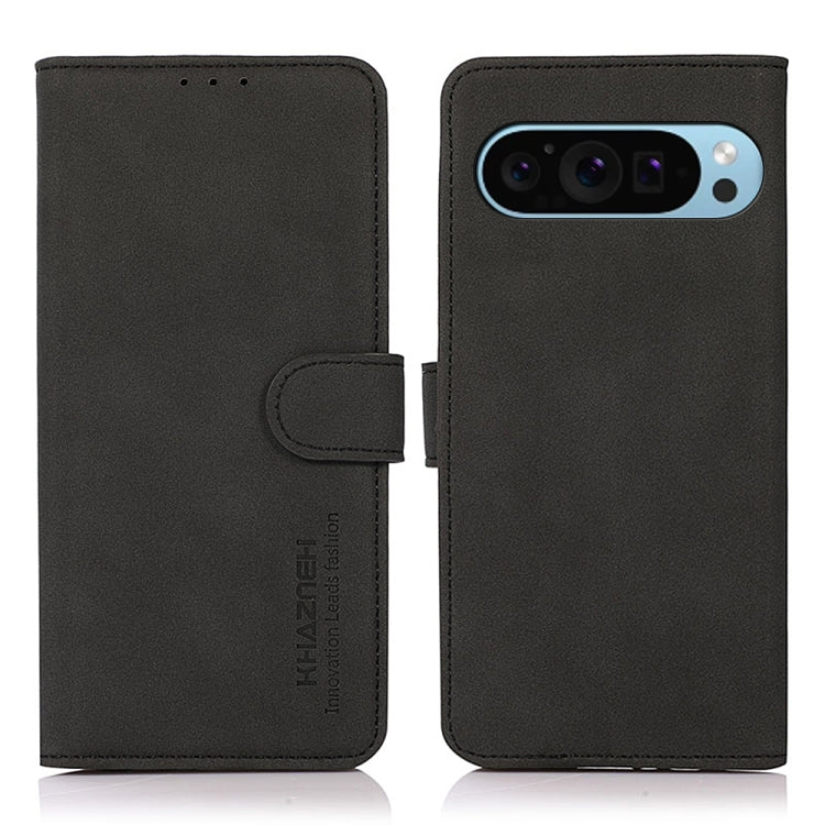 Matte texture leather phone case with folio flap and strap closure, black, back view