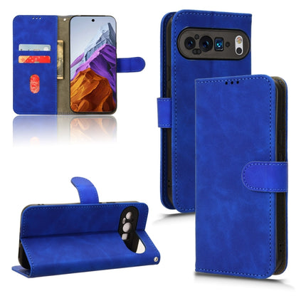 Blue leather flip phone case with magnetic closure and card slots.