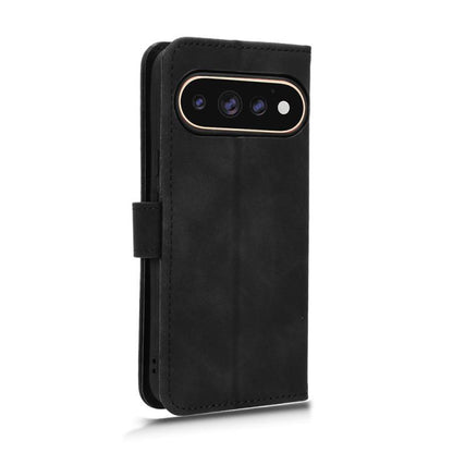 Black magnetic leather flip phone case with camera cutout and side strap