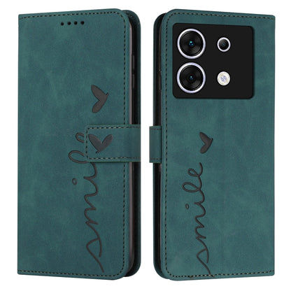 Teal leather wallet phone case with heart embossing, stitched heart-and-name script, flip strap