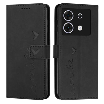 Black leather wallet phone case with heart embossing, stitched heart-and-name script, flip strap