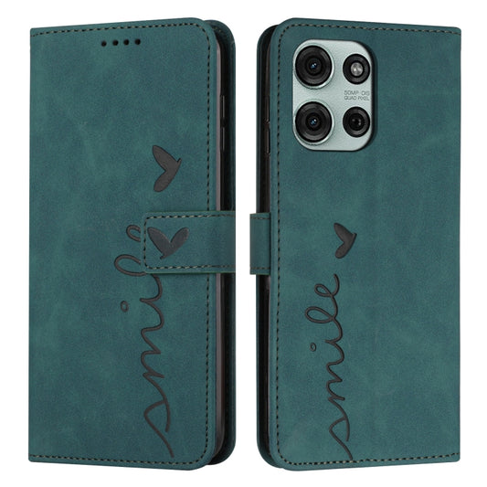 Teal leather phone case with heart-style embossed pattern and long lanyard strap