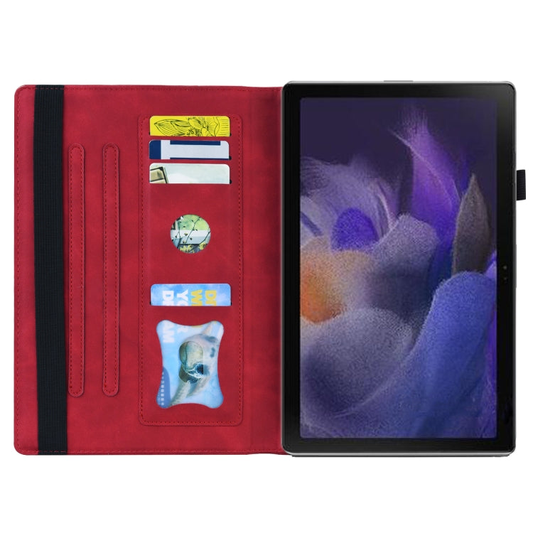 Red leather tablet case with interior card slots and horizontal flip cover.