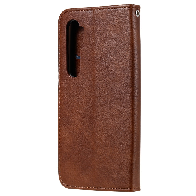 Brown leather phone case with camera cutout and stitched edge