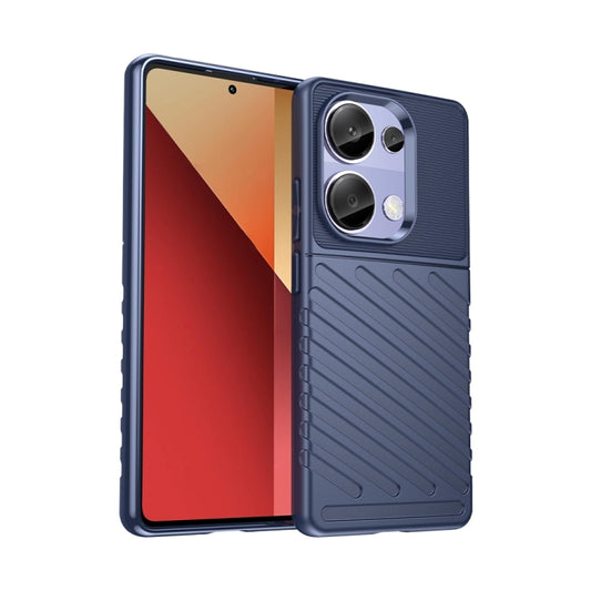 Shockproof TPU phone case in blue with textured grip and triple-camera cutouts