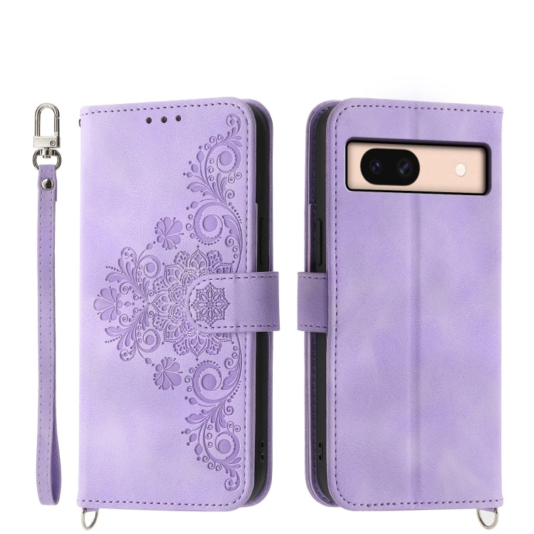 Embossed leather wallet phone case in lavender purple with floral pattern and wrist strap
