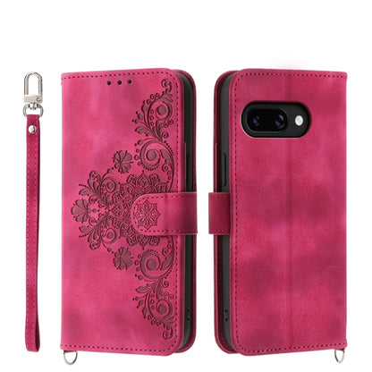 Hot pink leather phone wallet case with embossed floral pattern and wrist strap
