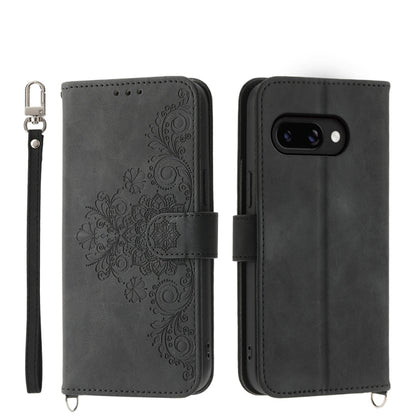 Black embossed floral leather wallet phone case with wrist strap and flip cover