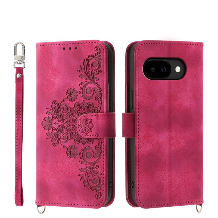 Hot pink leather phone wallet case with embossed floral pattern and wrist strap