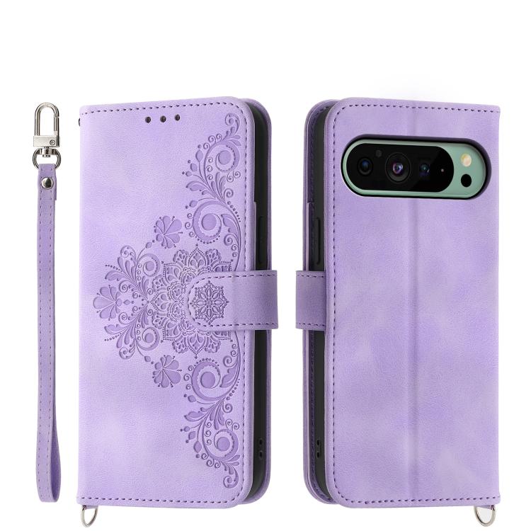Purple leather phone wallet case with embossed floral pattern, wrist strap, camera cutout