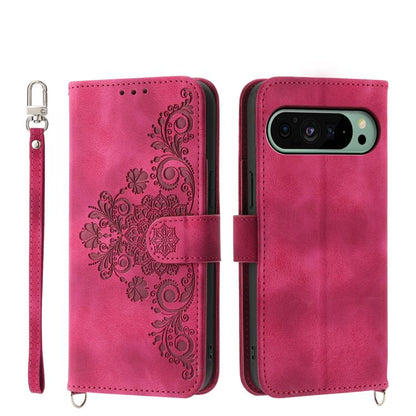 Magenta leather phone wallet case with embossed floral pattern, wrist strap, camera cutout