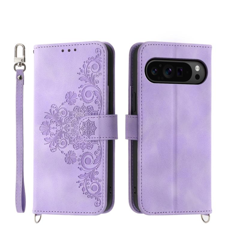 Purple leather phone wallet case with embossed floral pattern and wrist strap, magnetic flap