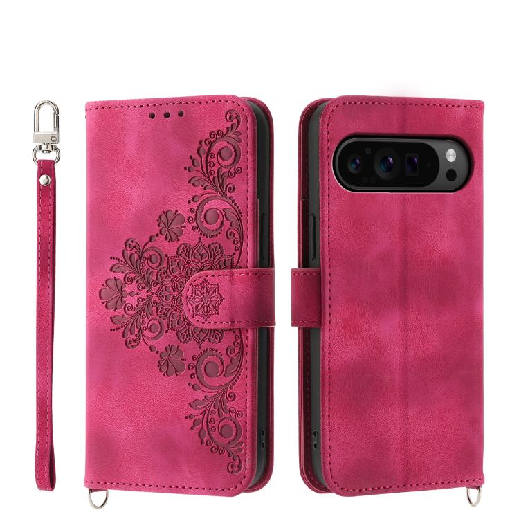 Magenta leather phone wallet case with embossed floral pattern and wrist strap, magnetic flap