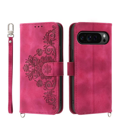 Magenta leather phone wallet case with embossed floral pattern and wrist strap, magnetic flap
