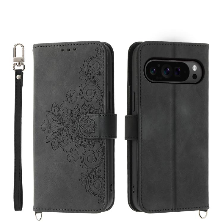 Dark gray leather phone wallet case with embossed floral pattern, wrist strap, magnetic flap