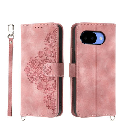 Pink embossed floral wallet phone case with flip cover and wrist strap