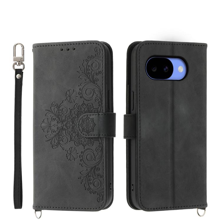 Dark leather phone wallet case with embossed floral pattern, wrist strap, magnetic flap