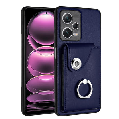 Blue PU wallet phone case with card pocket and ring holder, snap flap, camera cutouts.