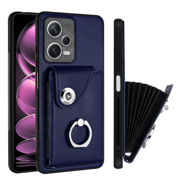 Blue PU wallet phone case with ring holder and folding card insert, snap flap, camera cutouts.
