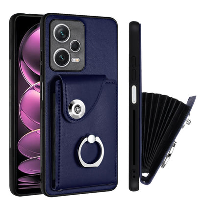 Blue PU wallet phone case with ring holder and folding card insert, snap flap, camera cutouts.