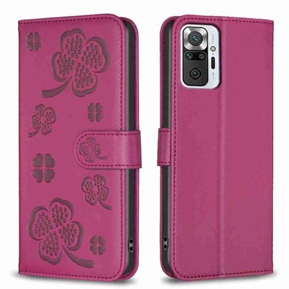 Rose red four-leaf embossed leather phone case with flip strap and cutouts