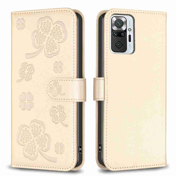Beige four-leaf embossed leather phone case with flip strap and camera cutout