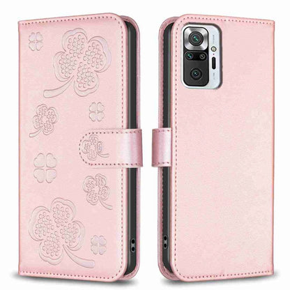 Pink four-leaf embossed leather phone case with flip strap and camera cutout