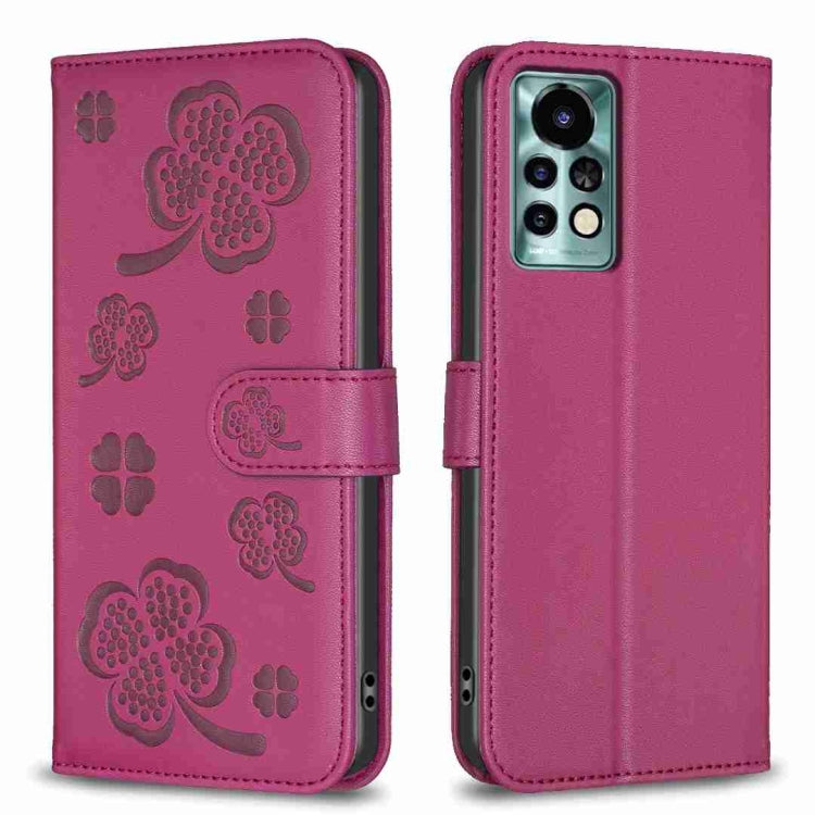 Rose red four-leaf embossed leather phone case, folio strap, camera cutout.