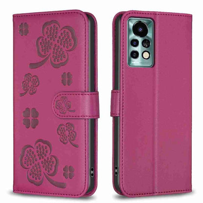 Rose red four-leaf embossed leather phone case, folio strap, camera cutout.
